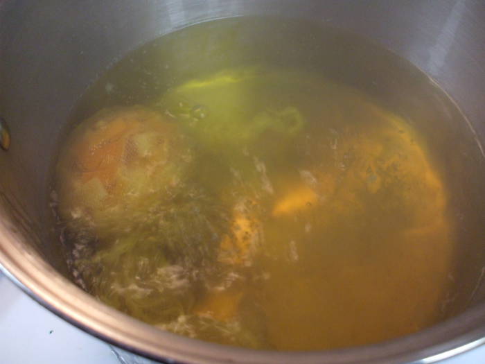 Steeping the orange peel in boiling water: near the end.