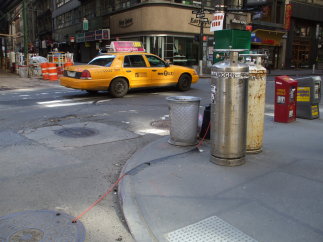 Two liquid nitrogen dewars on a corner of Broadway in the Financial District in lower Manhattan.