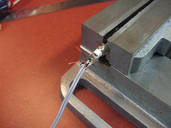 Soldering the Litz wires using a small vise.