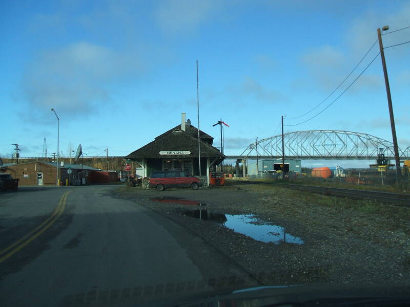 A bridge and the railway station in Nenana, Alaska, on the Tanana River, between Fairbanks and Denali.