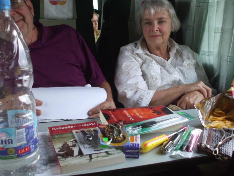 Romanian peddlers lay out an array of goods on board the train.