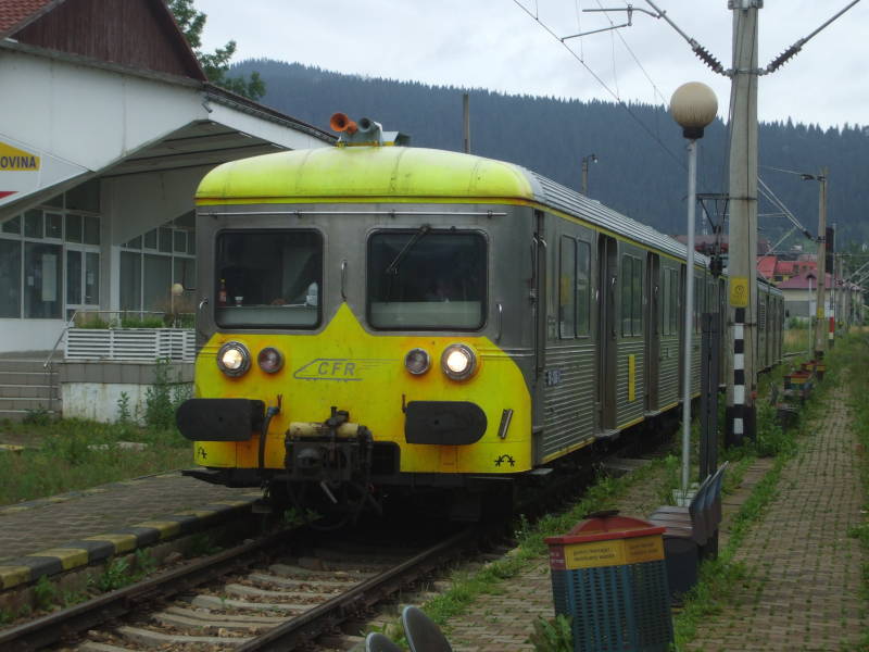 Local train pulls into the station in Gura Humorului, Romania.