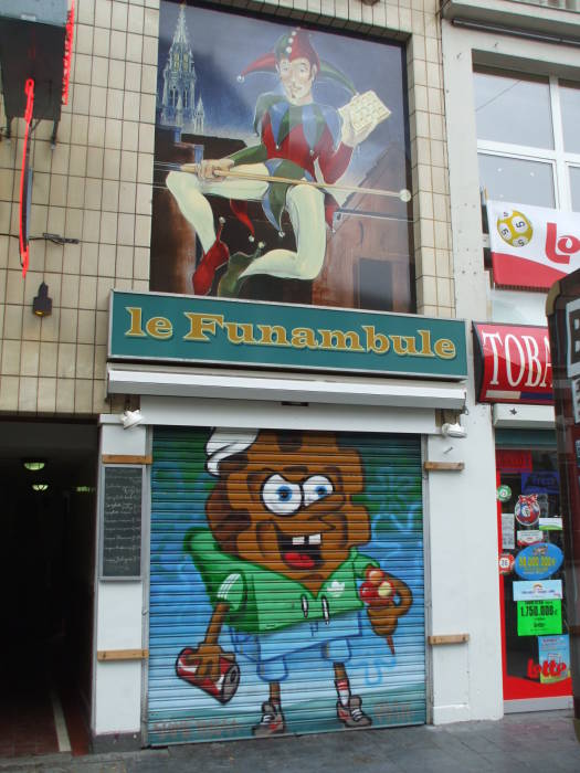 Spongebob Squarewaffle on a steel door next to the passageway leading to À la Bécasse cafe in Brussels.