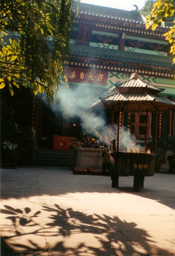 Ornate large iron incense burner at a Buddhist temple in China.