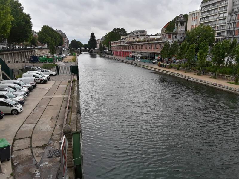 Walking south along the Canal Saint-Martin in the 10th arrondissement in Paris.