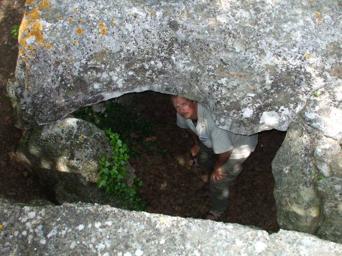 Bob inside the Dolmen de la Pitchoune, megalithic dolmen structure near the village of Ménerbes, in Provence.
