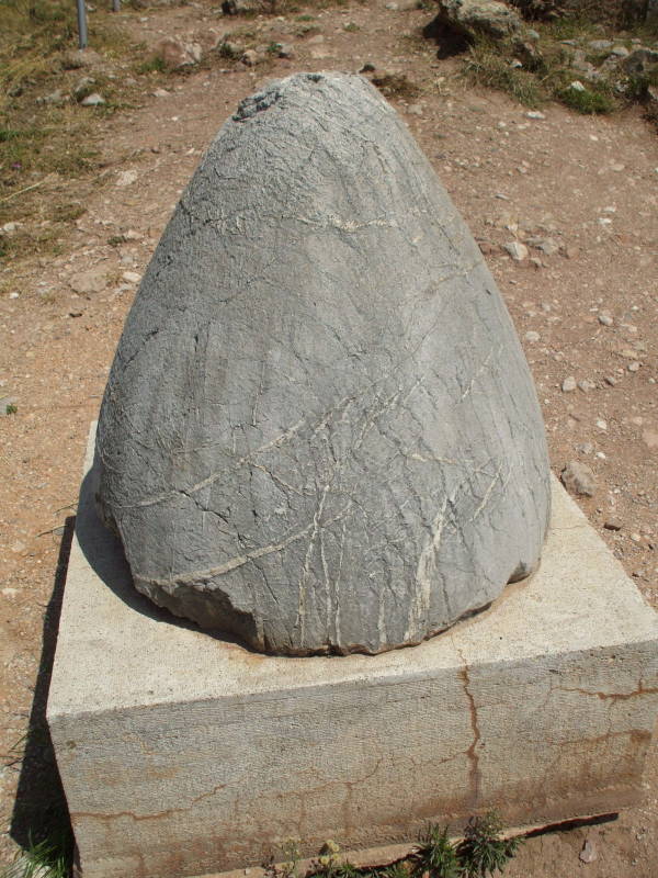 Close view of The Omphalos, the Center of the Universe, a tapered conical stone.