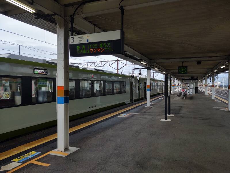 On the platform at Aizu-Wakamatsu Station, boarding the train to Kitakata.