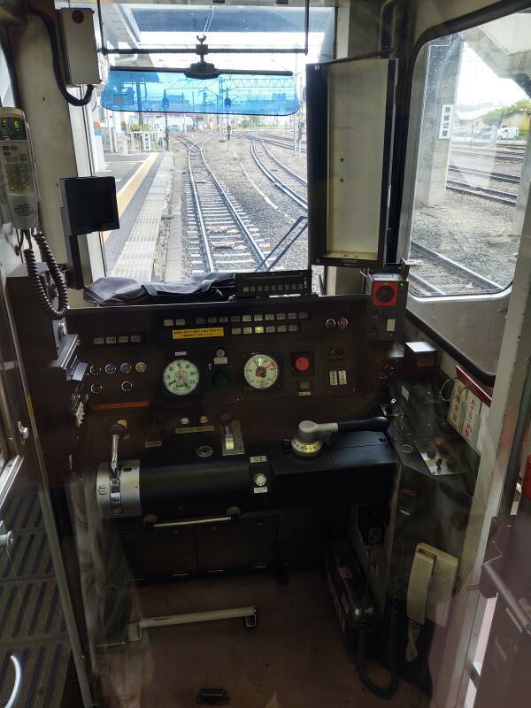 Engineer's compartment on a train at the platform at Aizu-Wakamatsu Station, soon to leave for Kitakata.