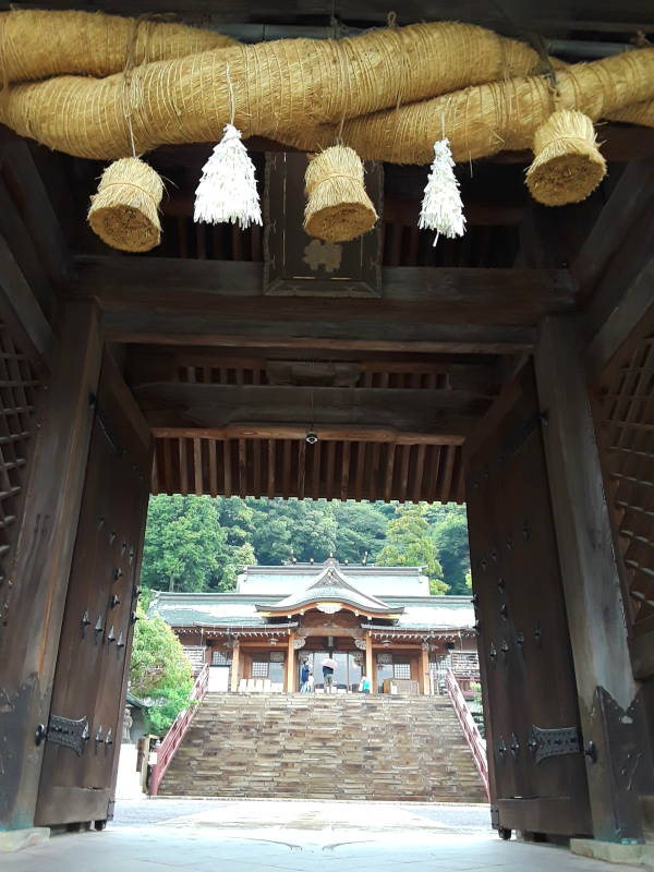 Entering Suwa Jinja in Nagasaki, beneath the twisted straw rope or shimenawa.