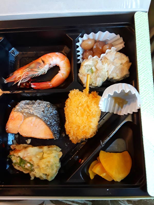 Eating my bentō box lunch on board the train from Hakata Station in Fukuoka to Nagasaki.