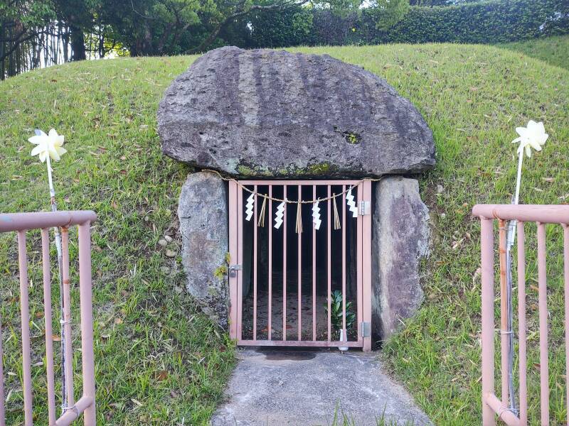 Metal gate closing off the Furumiya megalithic tomb.