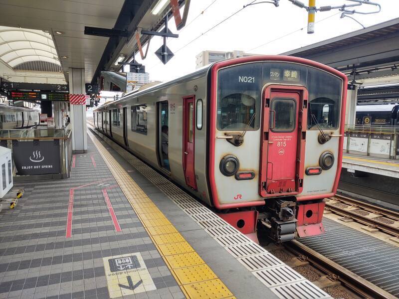 Local train on the platform at Ōita Station.
