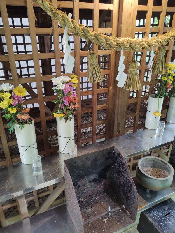 Shrine structure over graves at the top of the round conical section.