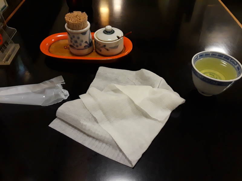 Matcha and oshibori in a udon restaurant in the covered markets.