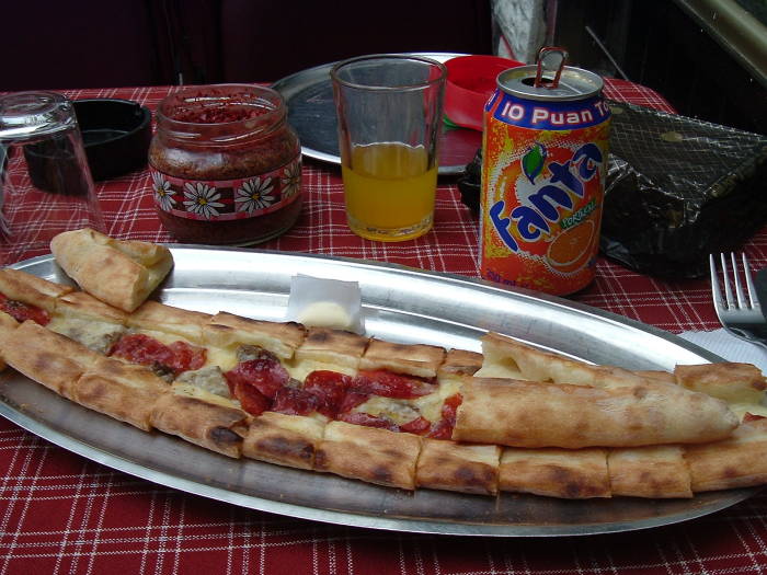 Turkish pide with cheese and meat.