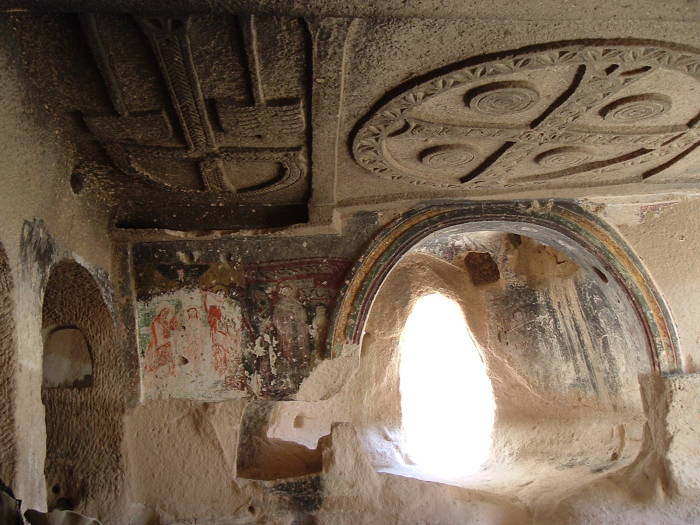 Frescos and stone carvings in the Church of the Three Crosses, in Rose Valley, near Göreme, Cappadocia, Turkey.