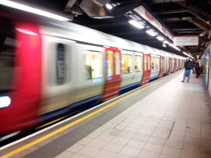 London Underground train arrives at the Euston Square Tube station.