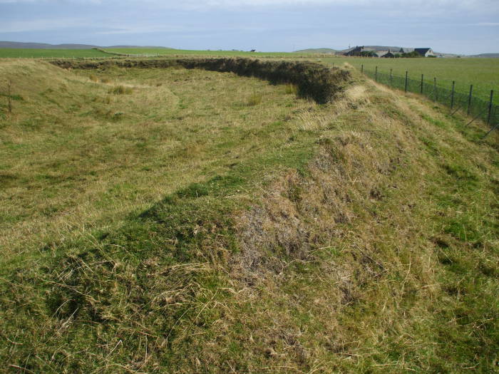 The henge surrounding the Maeshowe chambered cairn and passage tomb.