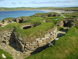 Neolithic dwellings exposed on the beach at Skara Brae in Orkney.
