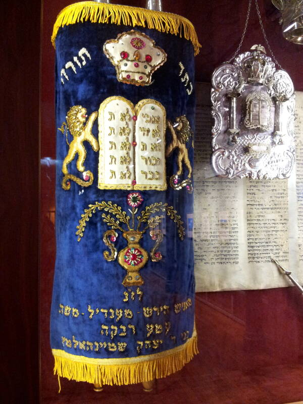 Torah wrapped in a velvet cover, and a yad or pointer in the lower floor of Eldridge Street Synagogue Museum