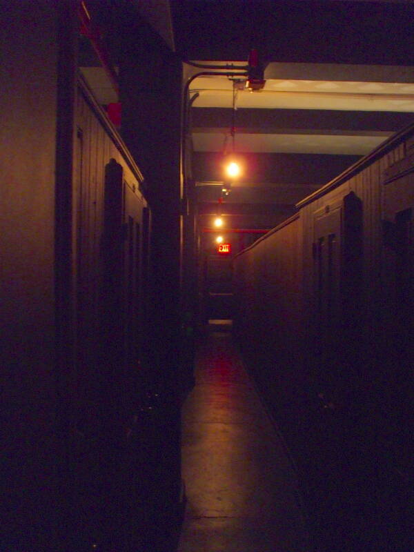 Hallway at the Bowery House, night.