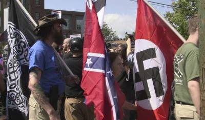 Neo-Confederate Donald Trump supporters with Nazi flags.