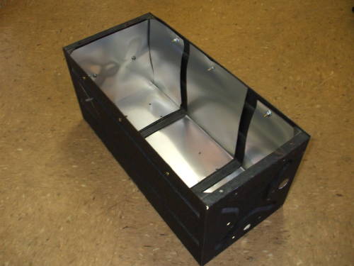 Large steel equipment case lined with aluminum flashing.