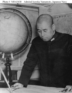 Admiral Isoroku Yamamoto examining naval charts.