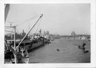 Shanghai harbor as seen from the USS Chaumont in 1938-1941.  Junks, small boats, and another U.S. cargo ship.