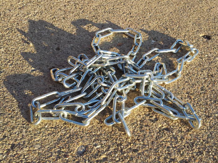 Metal chain in the sunlight.