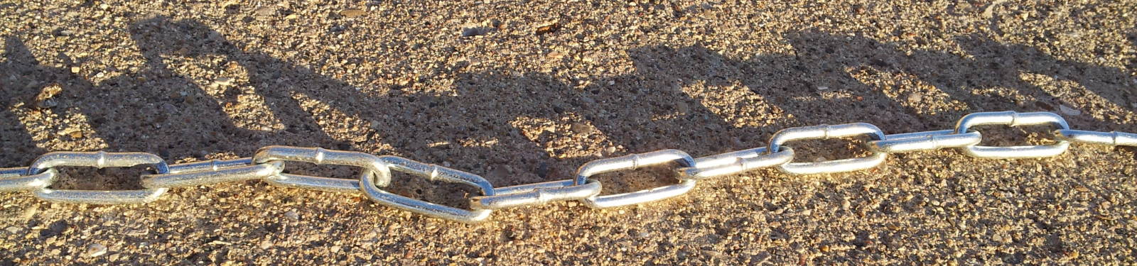 Metal chain in the sunlight.