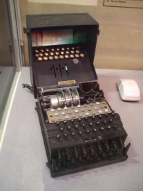 German Enigma encryption machine, three rotors, open with rotors exposed.