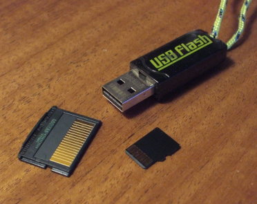 1 GB xD memory card, 16 GB MicroSD memory card, USB flash drive.