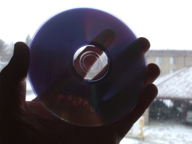 Blank DVD+R media shows its translucency.