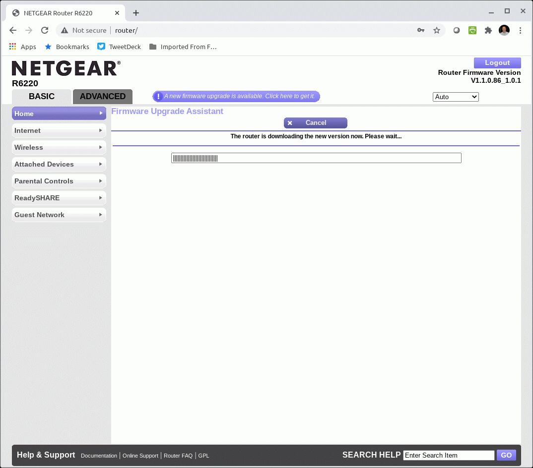 A Netgear router is downloading firmware update.