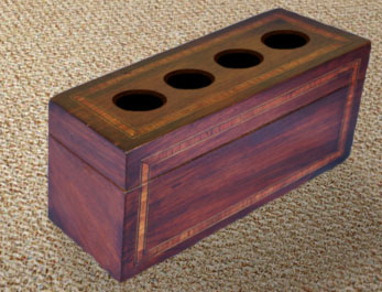 A 4-hole mahogany Malaysian finger box.