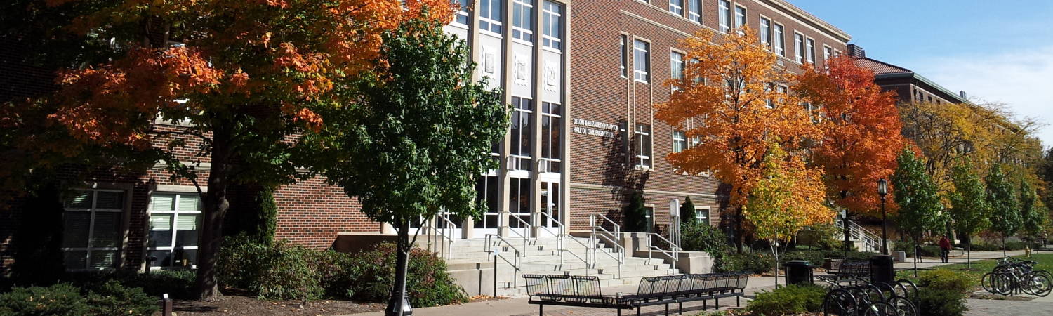 Purdue University campus in fall: colored leaves in front of the civil engineering and chemical engineering buildings.