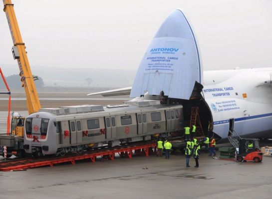 Bambardier railway car being transported in an Antonov heavy cargo aircraft.