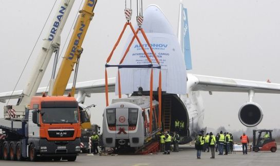 Bambardier railway car being transported in an Antonov heavy cargo aircraft.