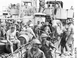 French military boat and crew in southeast Asia.