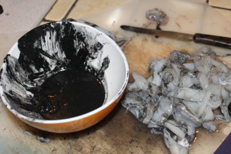 Bowl of black squid ink, especially opaque as it's from Tongan squid.