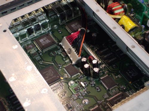Power connector is removed from main board.