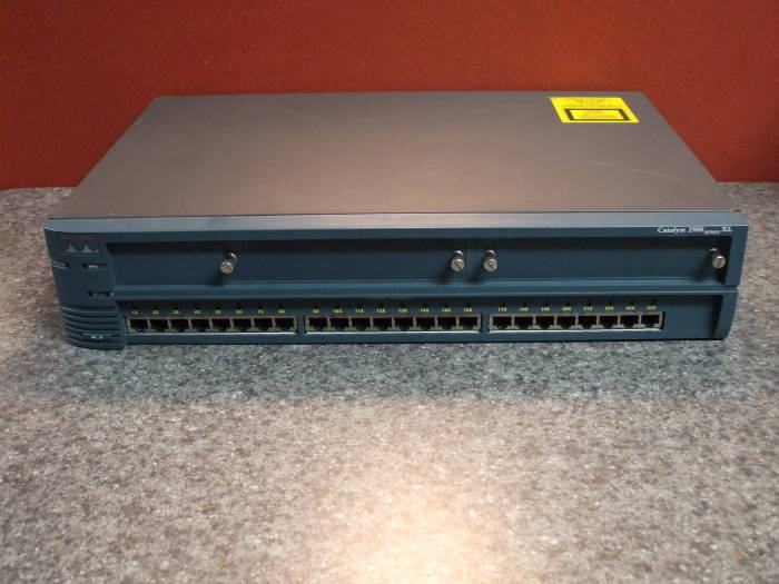 Cisco Catalyst 2924 XL switch, forwarding Ethernet frames at the Physical and Link-Layer Control layers.
