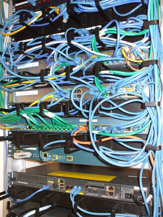 Rack of Cisco Ethernet switches