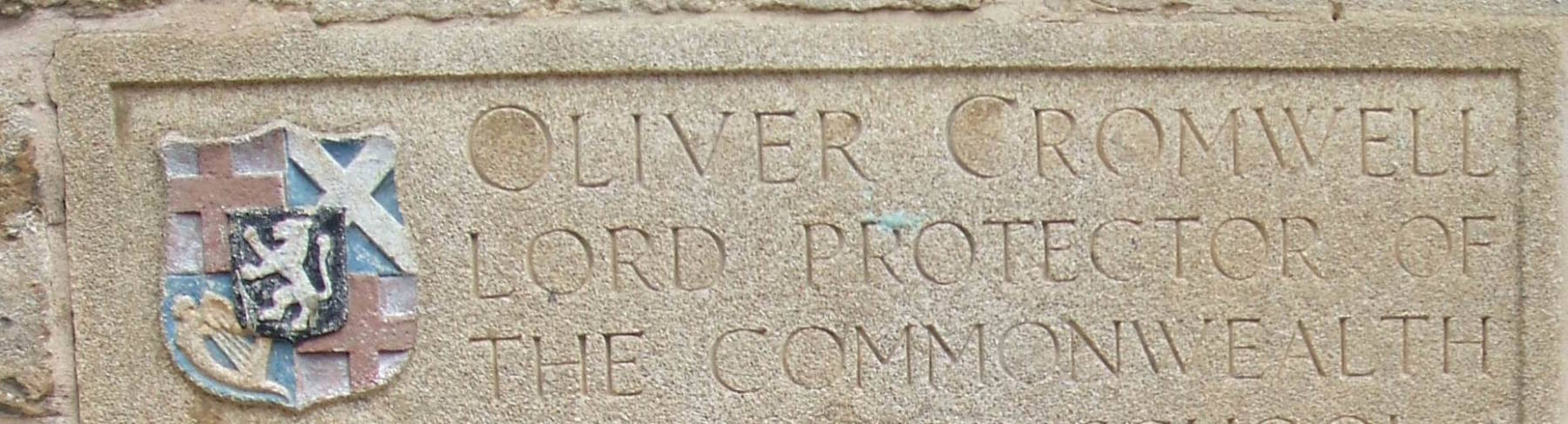 Carved sign on Oliver Cromwell's school.