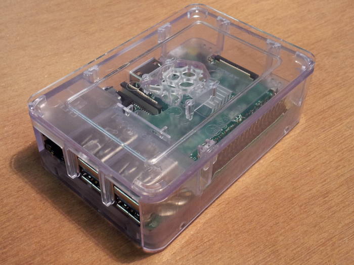 Raspberry Pi 3 enclosed in acrylic case.