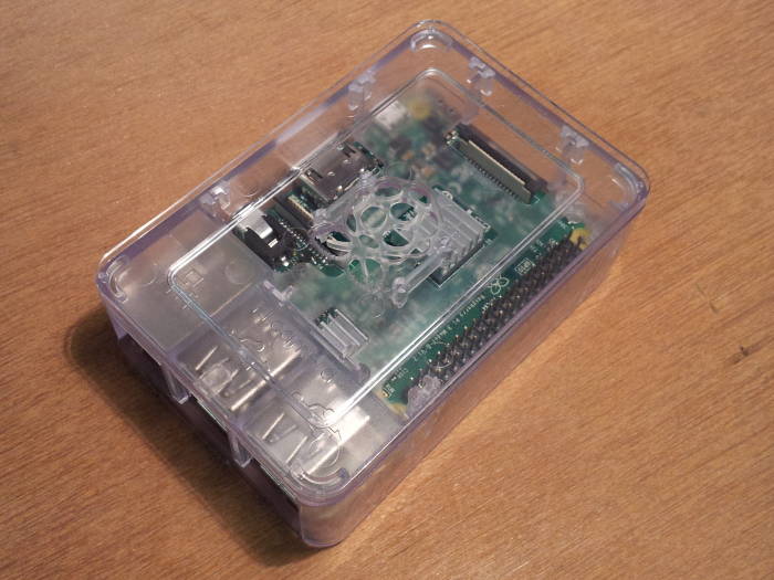 Raspberry Pi 3 enclosed in acrylic case.