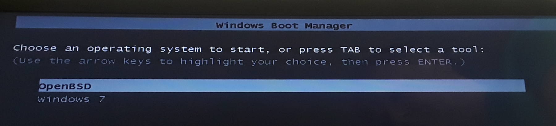 Windows boot loader with a choice of Windows 7 and OpenBSD.