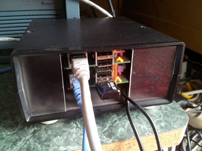 Two Raspberry Pi Linux systems in a small case, both with Ethernet network connections and one with an 802.11 WLAN wireless network interface.